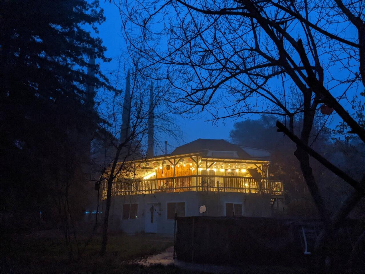 warm deck lights in a blue evening, Placerville, California