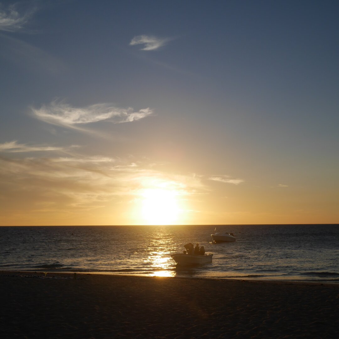 boat and sunset, Castaway Island, Fiji