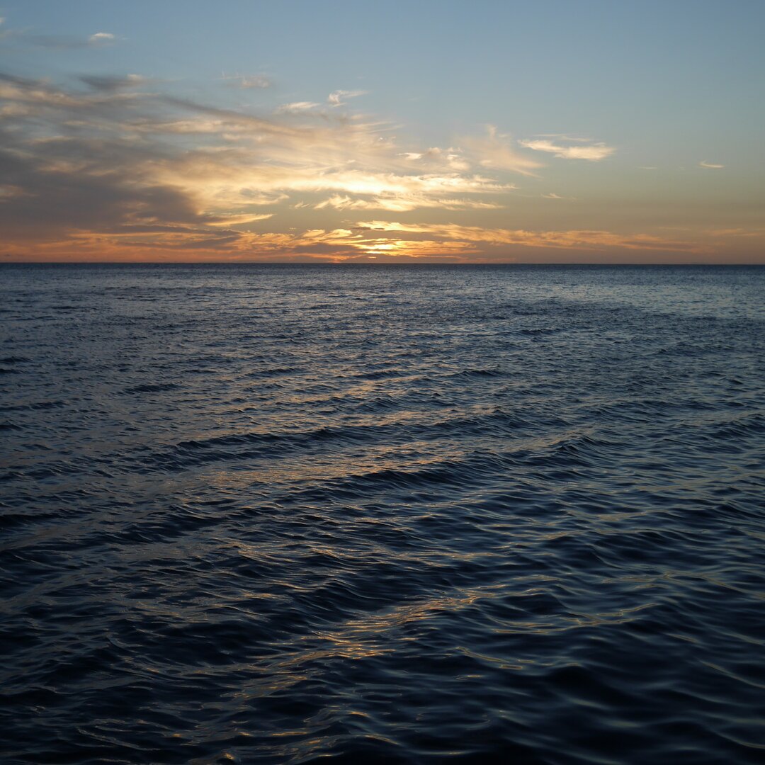 sunset and dark water, Castaway Island, Fiji