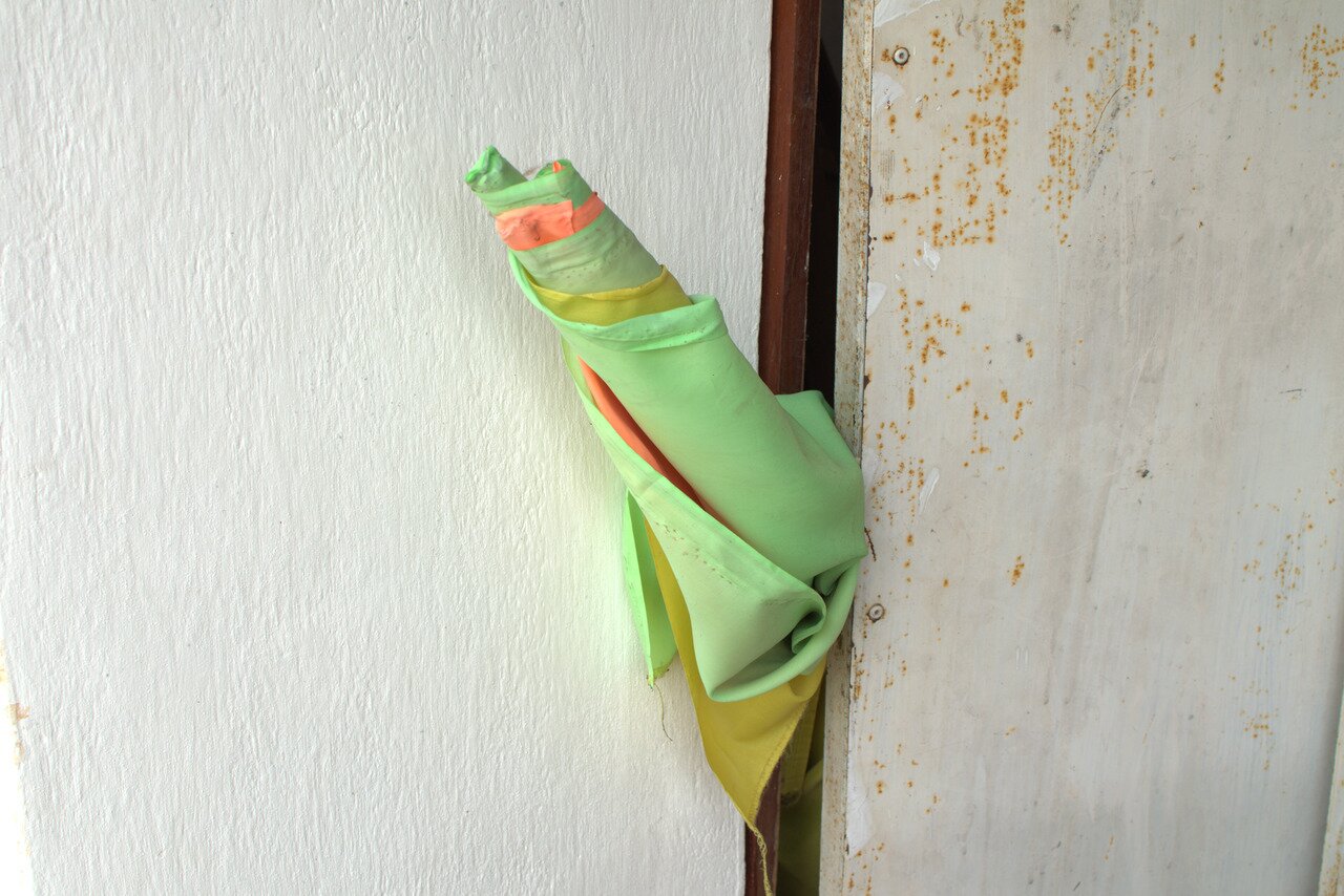 faded bunting, Vientiane, Laos