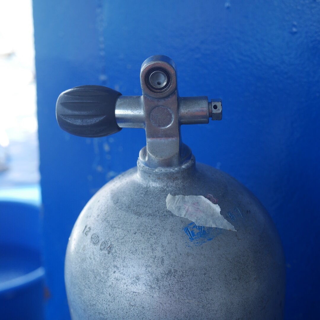 scuba tank, waters off Hat Thung Wua Laen, Thailand