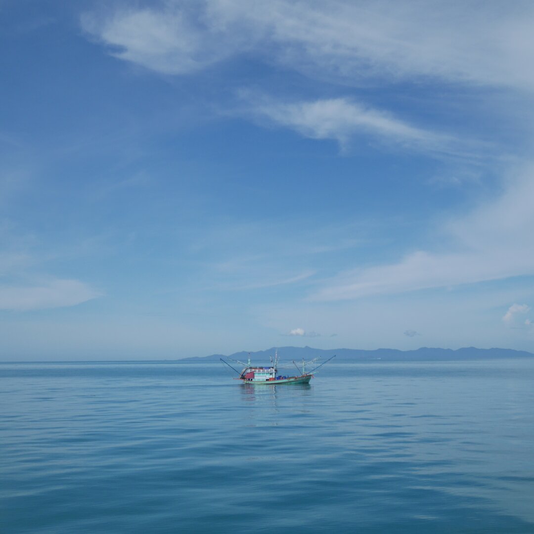 fishing boat on blue waters, Ko Samui, Thailand