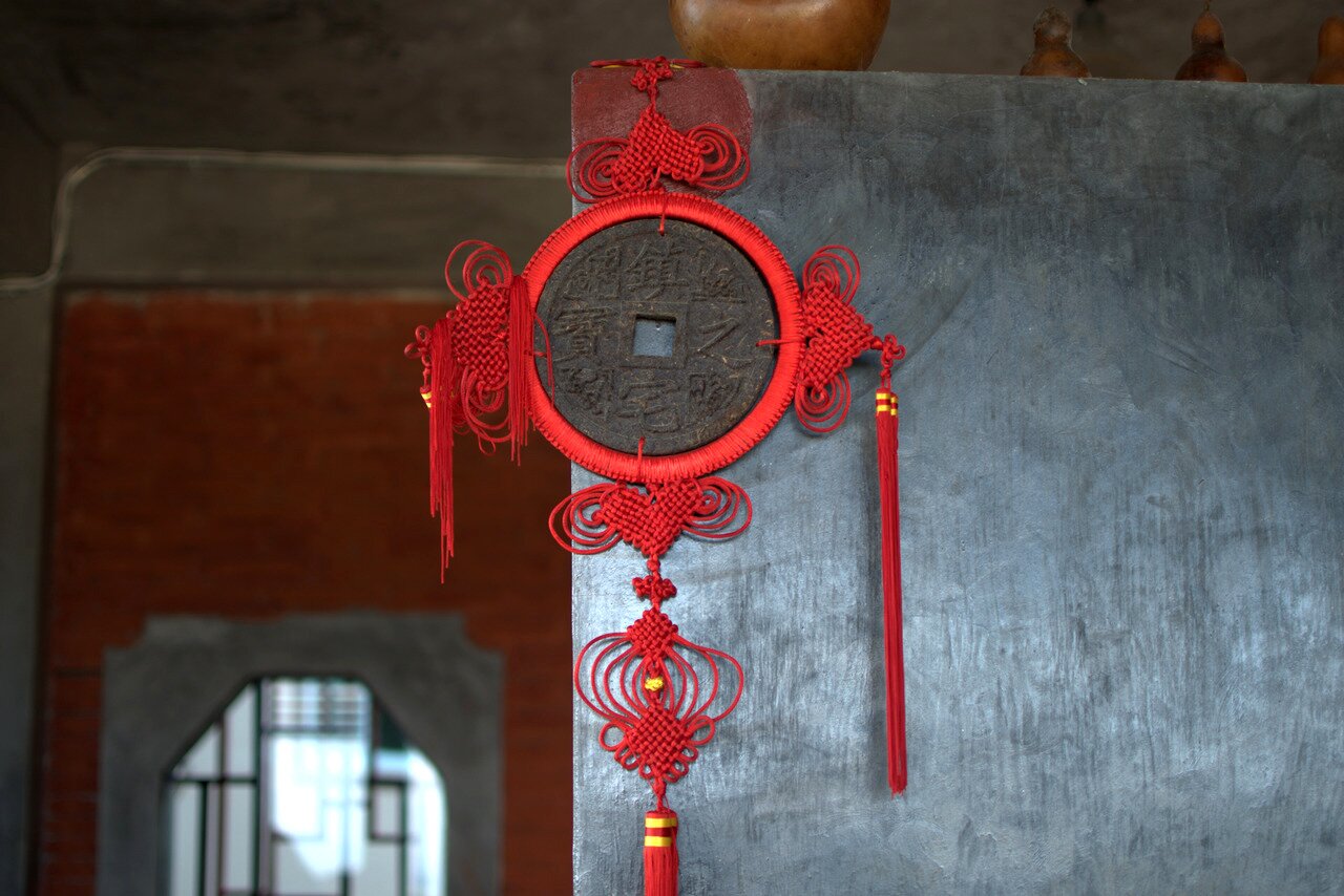 Chinese knotting and coin, Baan See See, Mae Salong, Thailand