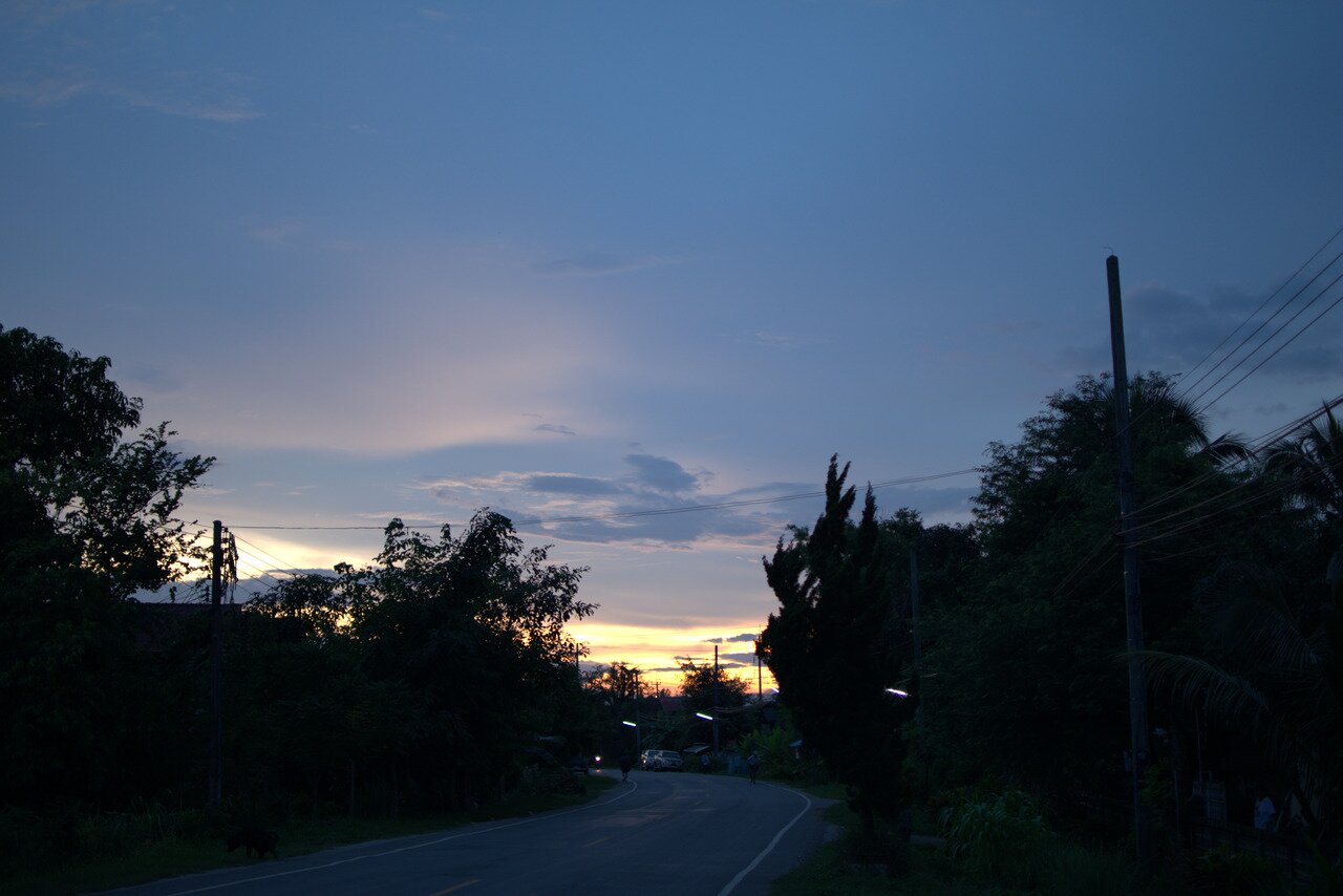 sunset and rural road, northern Thailand