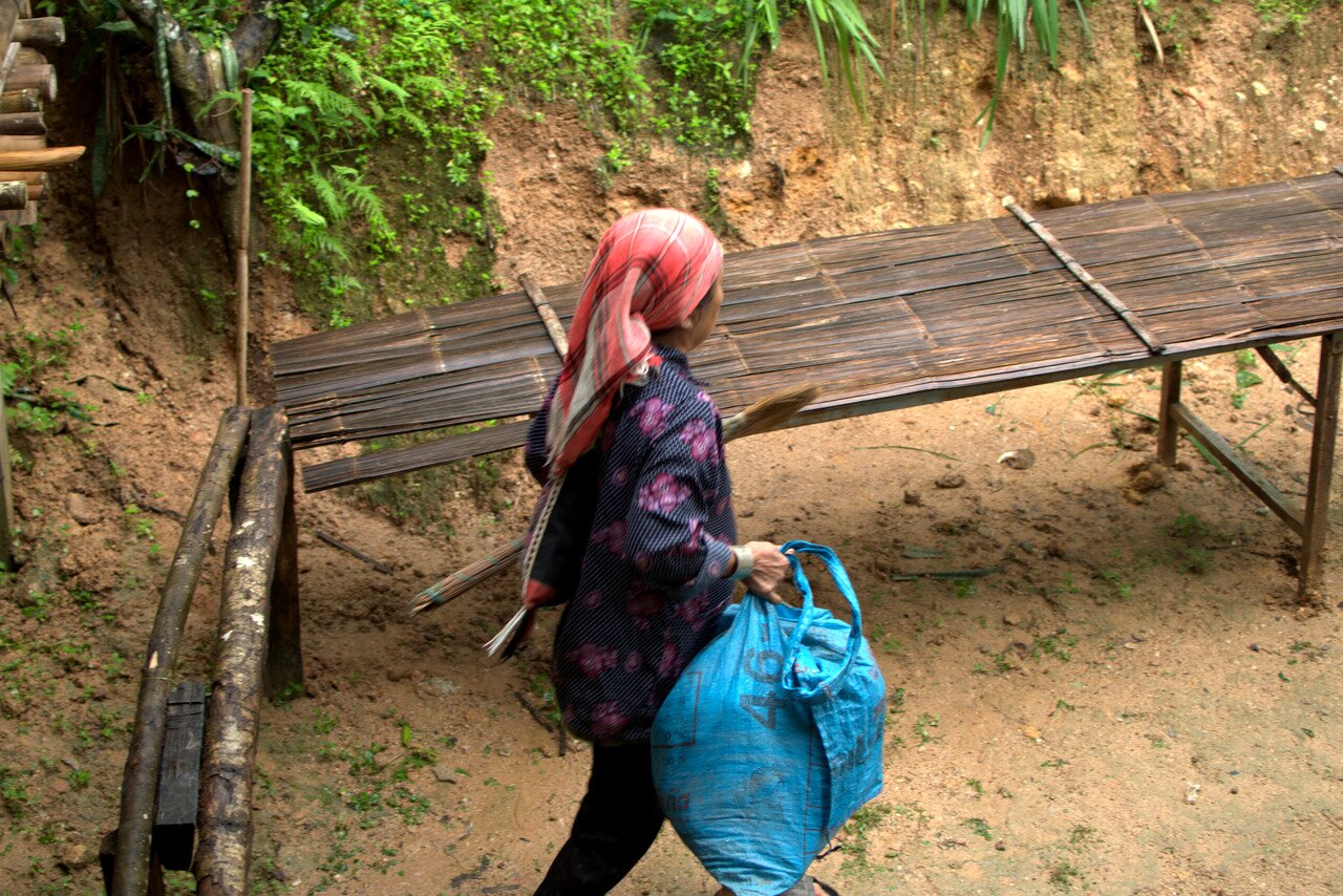 taking out the trash, Baan Pha Sert Nai, Thailand