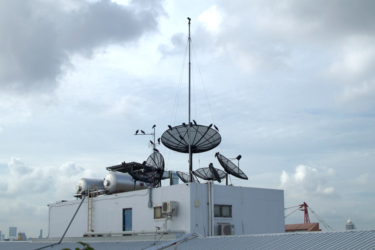 crows and antennas, Bangkok, Thailand