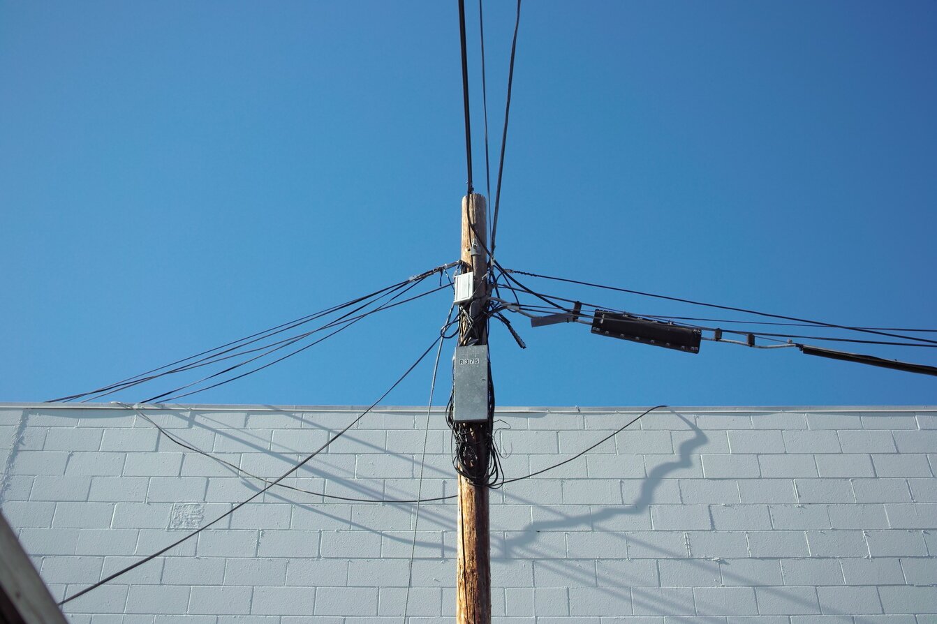black lines, white wall, blue sky, San José, California