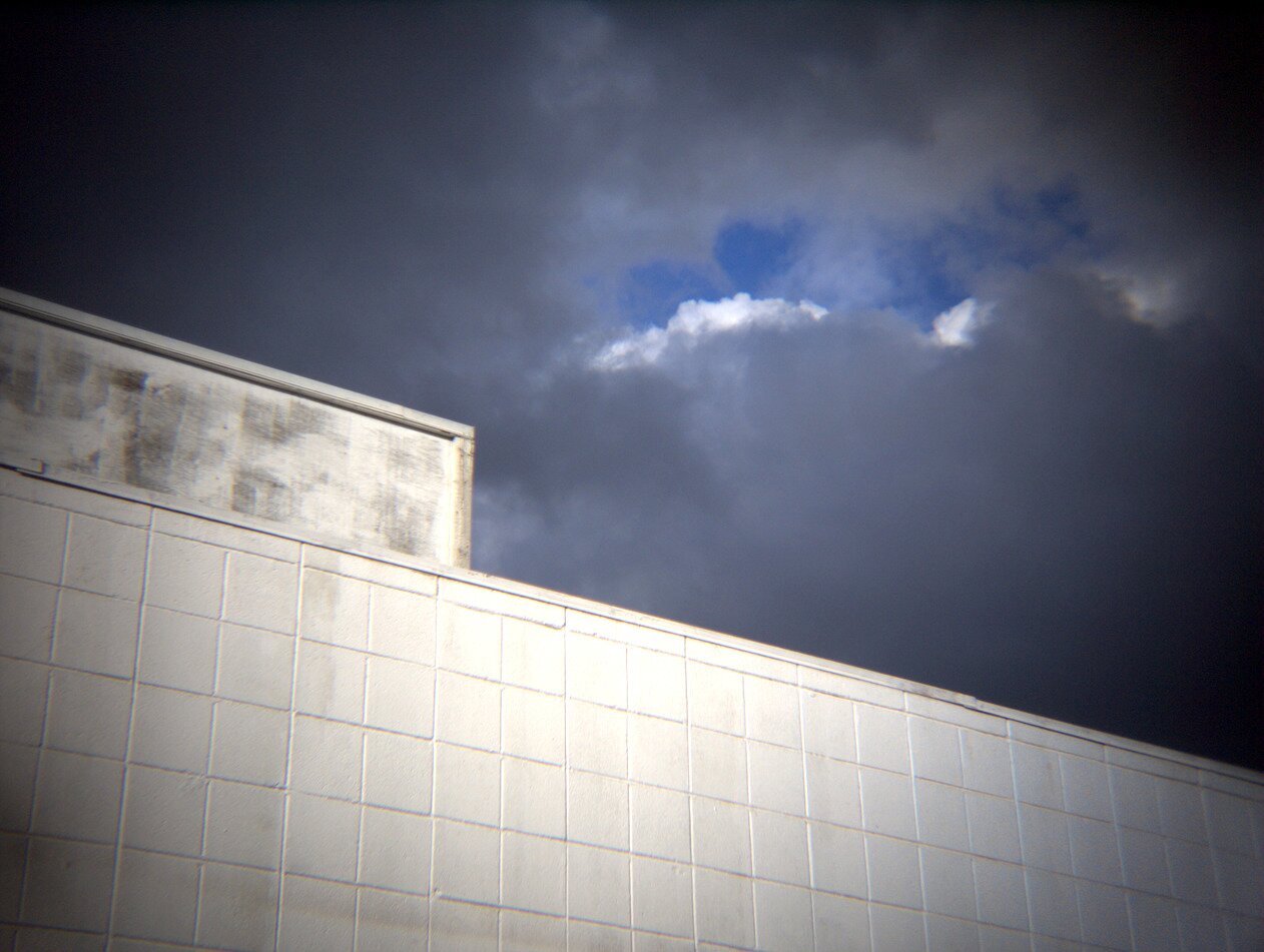 white wall, ominous clouds, San José, California